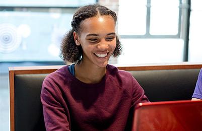 girl at computer in student union